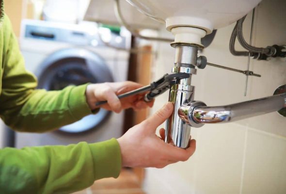 Professional plumbing services in Parma Heights fixing a bathroom sink